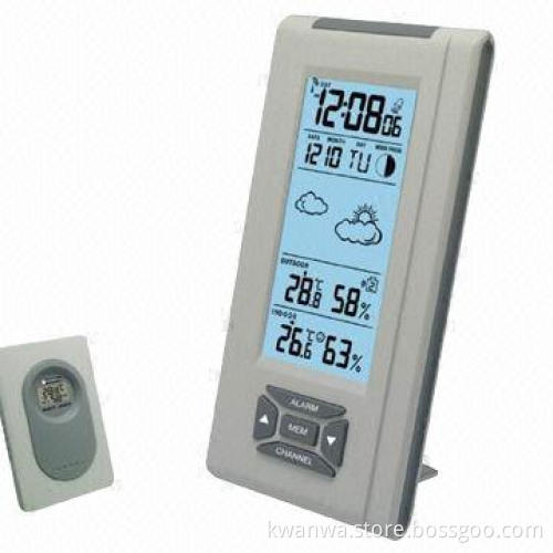 Radio controlled alarm clock with indoor and outdoor temperature and humidity display
